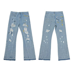 Gallery Dept Multi‑Ripped Paint‑Speck Flare Jeans